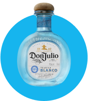 a bottle of don julio blanco tequila on a blue background
